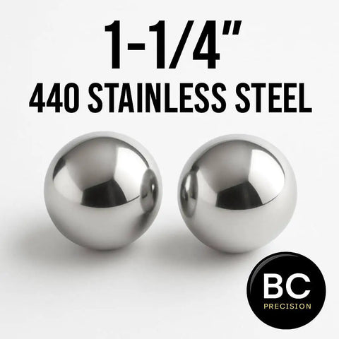 Two Pack One And One Quarter Inch Diameter 440 Stainless Steel Bearing Balls G25 Precision Grade For Industrial Machinery Mechanical Projects And Hobby Use Tough Workhorse, front view of two polished steel balls displaying size and material.