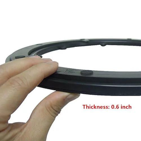 Close-up of 10 Inch Heavy Duty Lazy Susan Hardware Plastic Rotating Turntable Bearing with Steel Ball Bearings being held to show thickness
