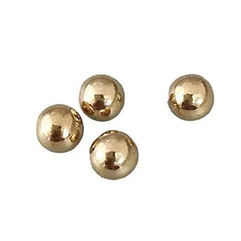 Close-up of four 1.8mm solid brass balls for electric switches, showcasing their shiny copper finish from the 100pcs set.