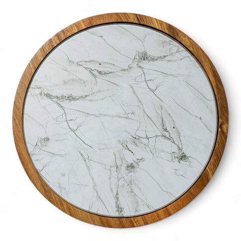 Close-up view of the removable glass plate of a 12 inch acacia wood lazy susan turntable with marble texture.