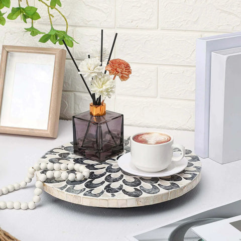 12 inch mother of pearl lazy susan turntable with floral pattern, decorative wooden rotating tray on a table with coffee and flowers.