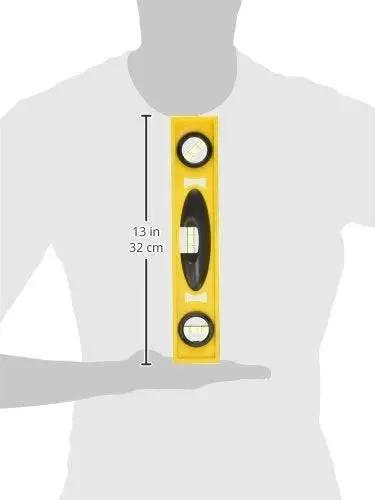 Image of a 12-Inch professional level with a shock-resistant, non-marring ABS body and top-read vial held by a person's arm.
