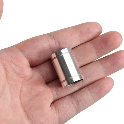 Close-up of 12mm bore linear bearing with double seals for dust resistance, emphasizing smooth, low-friction motion for precise CNC guidance.