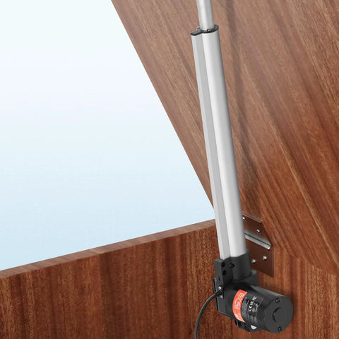 12V heavy-duty linear actuator with mounting bracket, 16-inch stroke, silver body and black motor, mounted on wooden door.