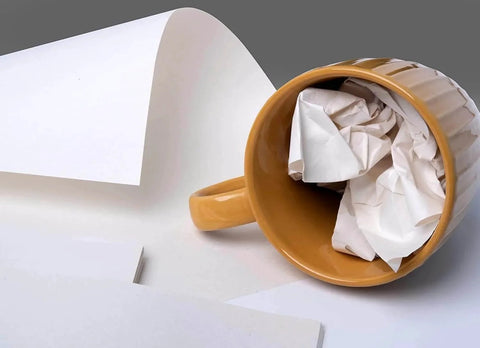 12x12 Inch Packing Paper 100 Sheets for Moving Fragile China and Glassware Protective Box Filler shown with a ceramic mug.
