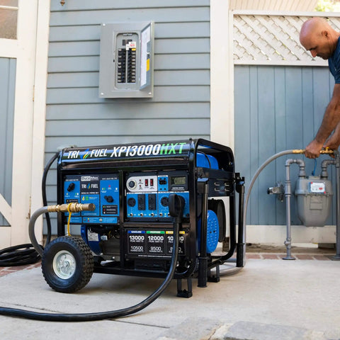 Tri Fuel 13,000 Watt Portable Generator Gas Propane Natural Gas With CO Alert For Home Backup installed outside home
