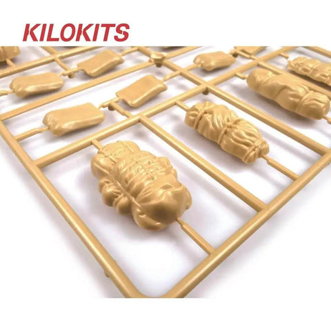 Unpainted plastic parts of One Thirty Fifth Scale Military Duffel Bag Set With Barracks Bag Folded Sleeping Bag Canvas Top And Sandbag Kit