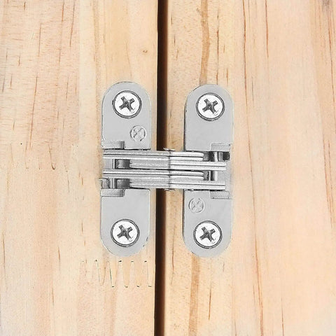 Installed Hidden Door Hinges Set For Cabinets 180 Degree Concealed Cross Hinges on wood surface