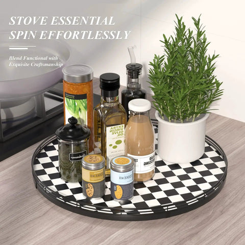 18 Inch Black And White Checkered Lazy Susan Turntable With Iron Frame Decorative Tray holding condiments and a plant
