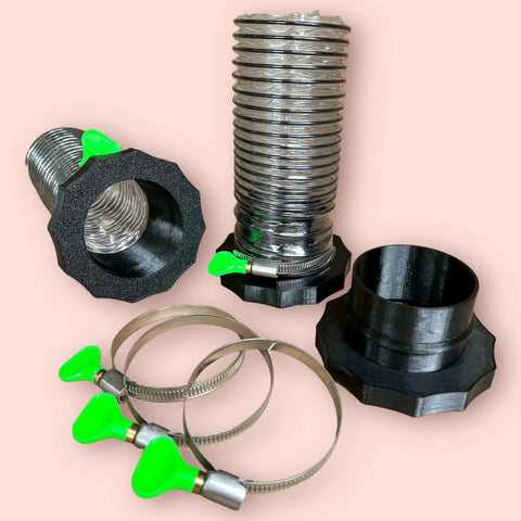 2.5" port MagDuct starter kit: corrugated metal dust duct, black plastic end adapters, green-handled hose clamps.