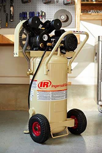 Ingersoll Rand P1.5IU-A9 2hp 20 gal Single-Stage Compressor (115/1) 42663401 in garage setting, beige tank with wheels.