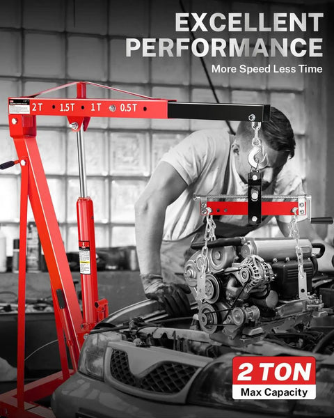 2 Ton Hydraulic Engine Hoist With Lever Folding Cherry Picker lifting car engine in garage with mechanic, red color