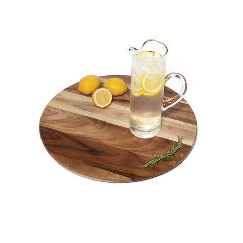 20 inch acacia wood lazy susan turntable designed for tables and counters, featuring a pitcher and lemons on top.
