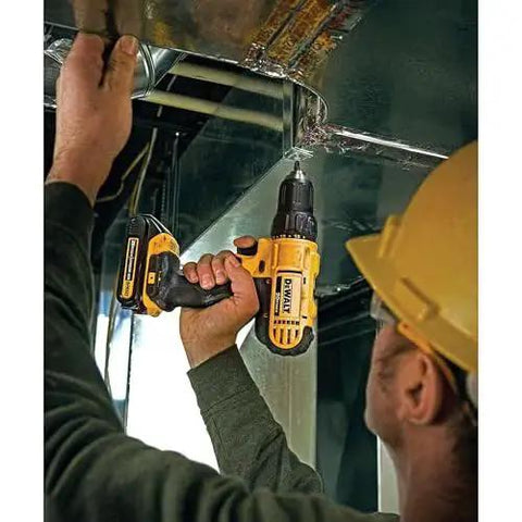 Worker using 20V Max Cordless Drill Driver Set With Two Speed Transmission High Performance Motor for metalwork, showing compact design