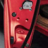 1 Inch Flush Mount Black Hole Plugs with Plastic and Metal Body Pack of 10 for 1 Inch Holes in panels, shown installed in a car door