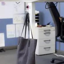 MagJig 60 Keychain Magnetic Base Clamp For Woodworking And Welding, 60 Lb Holding Power, securing bag to desk.