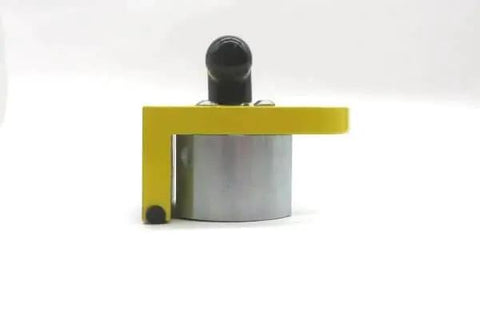 MagMount 150 GripRight 90 Degree Switchable Magnet with yellow and black components, for industrial fixtures and work benches.