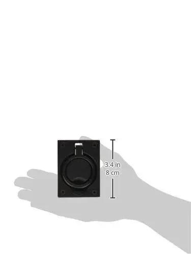 Solid Brass Flush Ring Pull Handle In Black Finish against hand for size reference