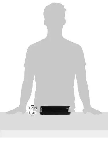 Silhouette showcasing size of Workhorse Electric 3-Hole Punch For Office, 12 Sheet Capacity, black steel punch heads on a desk.