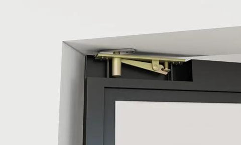 Close-up of pivot hinge and black steel frame on 36 In By 84 In Full Lite Opaque Frosted Glass Interior Pivot Door With Black Steel Frame And Pivot Hinge Hardware Kit Slick Frameless European Style Office Door For Modern Commercial Spaces.