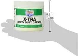 XTRA Heavy Duty Grease 14 Oz Tube with green and white label, held by an illustrative hand showing size