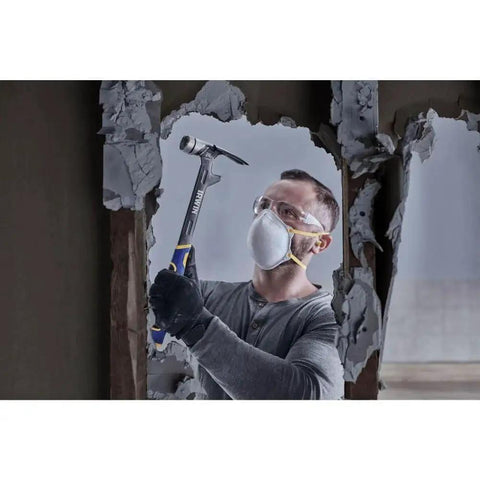 Person using 24 Oz Demolition Framing Hammer With Magnetic Nail Starter Delivers Powerful Nail Setting And Framing on drywall