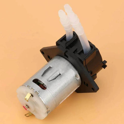 24V DC DIY Peristaltic Liquid Pump Dosing Pump for Aquarium Lab Analytical 10ml/min -90ml/min(black), side view on orange background
