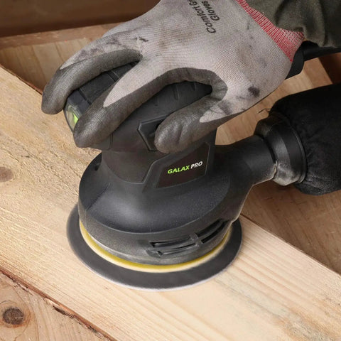 280W Orbital Sander 13000 RPM With Dust Collection And 15 Discs in use on wooden surface with ergonomic grip and dust bag.