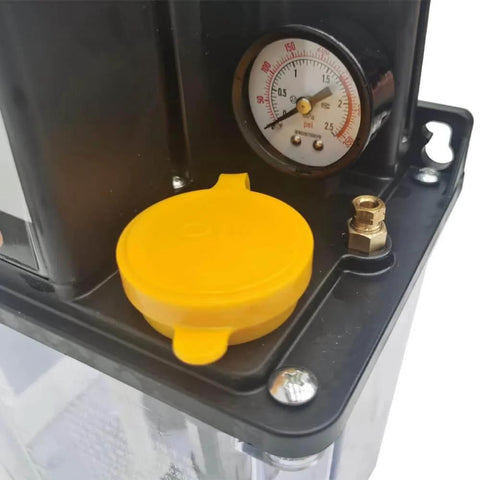 Close-up of 2L 110V Automatic Lubrication Pump with Dual Digital Display Gear Oiler showing oil cap and pressure gauge for CNC machinery.