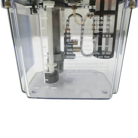 Close-up of 2L Automatic Lubricating Oil Pump 220V Lubrication Oiler With Pressure Testing tank showing level indicators and internal components