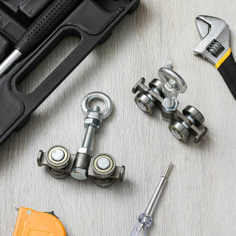 2 Pcs 4 Wheel Silent Trolley Assembly Rollers with Hidden Bolt Design shown with tools on a wooden surface