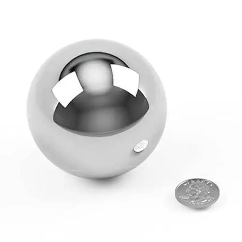 3 Inch Chrome Steel Ball Bearing G100 For Precision Machinery And DIY Projects next to a coin for size comparison
