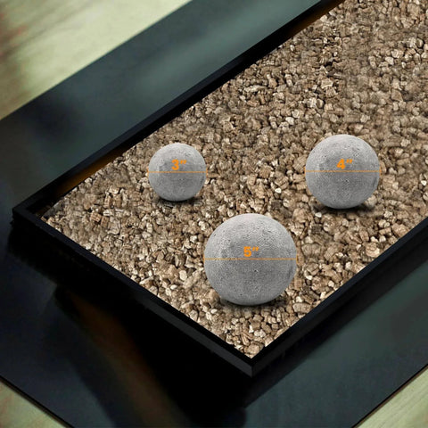 3 Inch Ceramic Fire Balls 15-Pack Round Fire Stones, Grey, displayed in fire pit with gravel base, different sizes in view