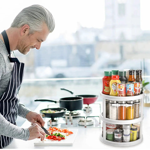 Man cooking in kitchen with 3 Tier Lazy Susan Turntable 12 Inch Round Rotating Kitchen Spice Organizer Non Skid Storage Container Grey