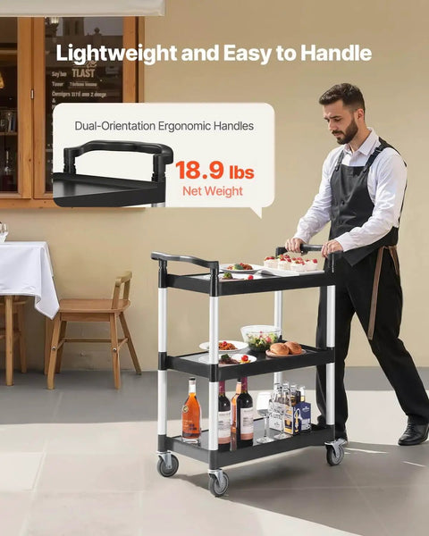 Heavy Duty 3 Tier Utility Cart With 360 Degree Swivel Wheels And Brakes, 300 Lb Load Capacity, in use in restaurant setting.