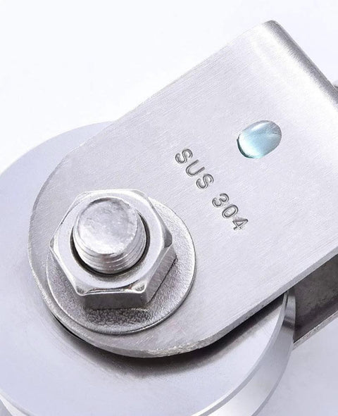 Close-up of 48MM Stainless Steel Crane Pulley Block and Tackle Pulley System with SUS 304 engraving and heavy-duty bearing.