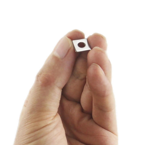 Hand holding 304 Stainless Steel M4 Square Plate Washer 10x10x1 mm, showcasing even load distribution and anti-rotation protection.