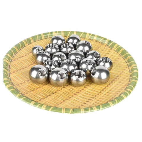 304 Stainless Steel Threaded Steel Ball, Half-Hole Threaded Steel Ball, M2 Drilled Threaded Steel Ball on a bamboo plate.