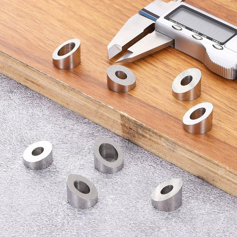 316 Stainless Steel 20 Degree Angle Washer 1 Quarter Inch ID Wire Rope Ends Ten, washers and caliper on table