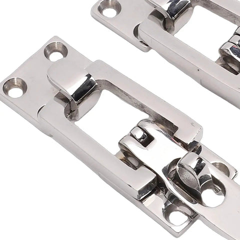 Close-up of two marine-grade 316 stainless steel lockable hatch latches with center tension cam and padlock holes