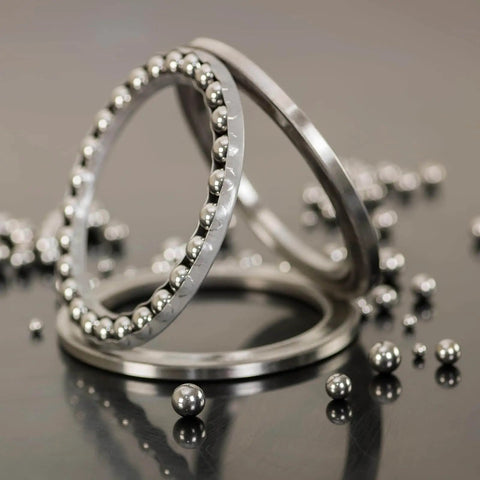 8mm Bearing Balls Set 100 Pcs 316 Stainless Steel G200 Precision Balls in bearings on a reflective surface