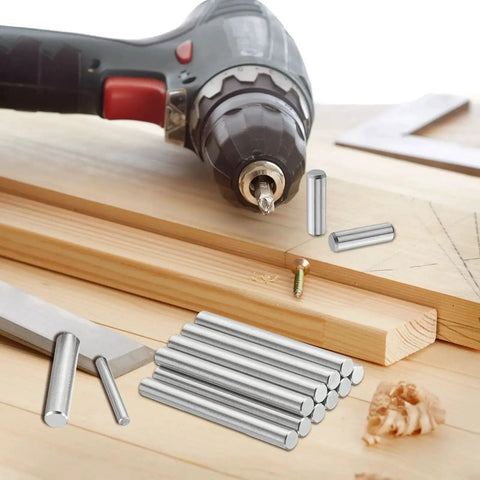 Durable 316L Stainless Steel Dowel Pins Set, 4 Pcs, 16mm Diameter By 30mm Length next to drill and wood on table