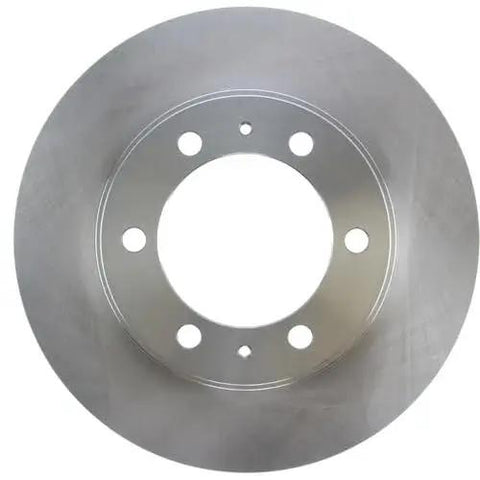 Centric C-Tek front brake rotor for Toyota; round metal brake disc with six lug bolt holes