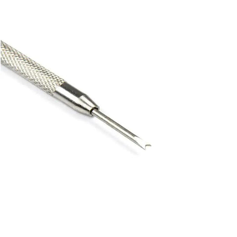 Close-up of stainless steel spring bar tool kit for watch bands no fuss link remover and pin removal set for adjustments.