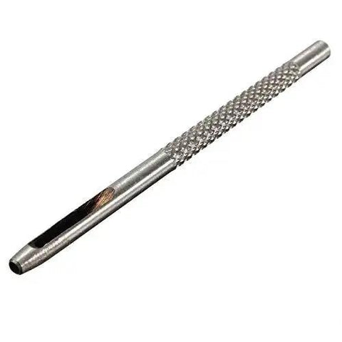 Close-up of metal punch tool from Pro Grade Heavy Duty Die Punch Snap Kit Rivet Setter With Base. Textured grip and tapered tip visible.