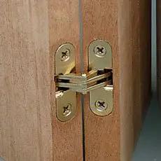 Invisible Hinge For Cabinets And Panels SOSS One Half Inch By Two And Three Eighths Inch Pair Brass Finished Zinc between wood panels