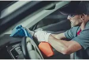 Mechanic uses Blue 12x14 Inch Shop Towels Set Of 50 Reusable 100 Percent Cotton Cleaning Cloths For Auto Shop Mechanic Garage Kitchen Industry Home Highly Absorbent Lint Free Bulk Rags on car dashboard.