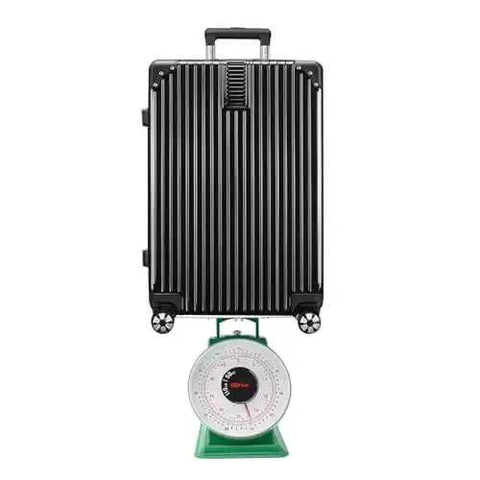 Beefy Heavy Duty Mechanical Kitchen Scale With Stainless Steel Platform And 110-Lbs Capacity Portion Control Dial Scale under a suitcase
