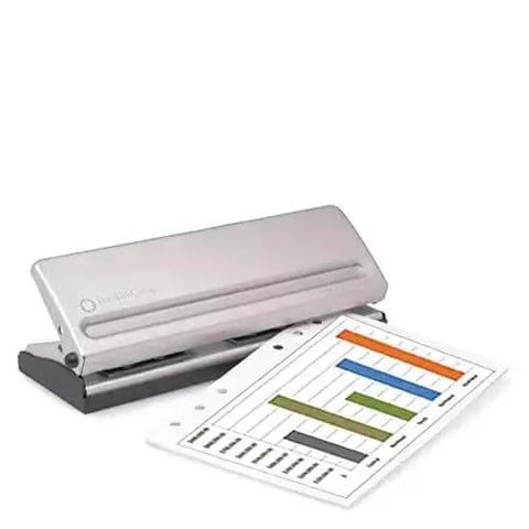 Metal hole punch for pocket and compact planners with spill proof chip collector and rubber non-slip base, shown with punched page.