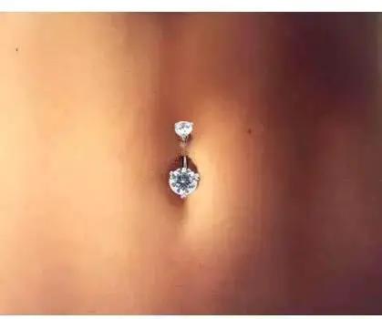 Pain Free Belly Button Piercing Kit With 14G Hypoallergenic Steel Needles And Clamp Pro Grade Navel Ring Starter Set in use